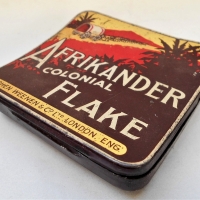 1940s Afrikander Colonial Flake concave pocket Tobacco tin - Sold for $27 - 2018