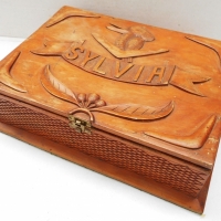 Carved pine Australiana box with Gum nuts & leave a central Kookaburra surrounded by boomerangs - Sold for $161 - 2018