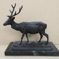 Early 1900's spelter figure of a stag on a black with green striations marble base - approx 20cm H - Sold for $62 - 2018
