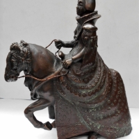 Heavy coppered sculpture of an Elizabethean woman on horseback - 34cms H - Sold for $68 - 2017