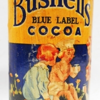 1930s Paper label tin -  Bushells Blue label Cocoa with paper label depicting fairies picking cocoa & Children drinking - Sold for $62 - 2018
