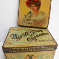 2 x c1900 Taddy & Co tobacco tins - Myrtle Grove Cigarettes incl pretty lady pocket tin - Sold for $81 - 2018