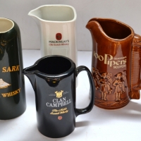 4 x Vintage advertising ceramic whisky  water jugs incl 100 Pipers, Clan Campbell, Cutty Sark & Mackinlay's - Sold for $62 - 2018