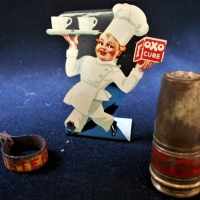 3 x vintage mini advertising items incl, Listerine tin corkscrew, OXO Cubes tin cut out sign of a chef carrying cups of Oxo beverages, and a small bra - Sold for $37 - 2018