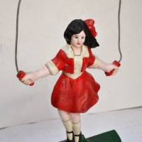 Reproduction 'Skipping Girl Vinegar' cast iron doorstop - Sold for $31 - 2018