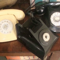 2 x Boxes assorted vintage rotary dial telephones & spare parts - dials, etc plus a oriental wall plaque - Sold for $75 - 2018