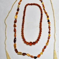 3 x Necklaces - natural amber, 1930s faceted amber & 1920s fine ivory beads with drop pendants to end - Sold for $37 - 2018