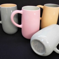 4 x Australian Pottery Guy Boyd pastel coloured tall mugs - approx 13cm H, incl signature to bases (1 af) - Sold for $31 - 2018