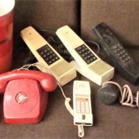 Large box lot assorted vintage telephones incl Ericsson LM intercom phone, black bakelite red phones, etc - Sold for $93 - 2018