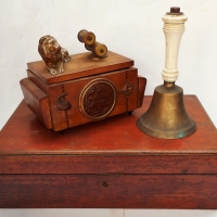 Group with Mahogany writing box, brass bell & musical cigarette box - Sold for $62 - 2018