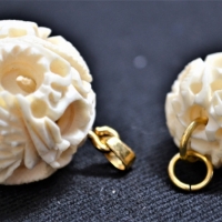 2 x Chinese Ivory puzzle ball pendants - Sold for $25 - 2018