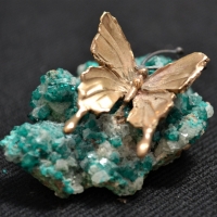 9ct Gold butterfly on quartz crystal - Sold for $31 - 2018