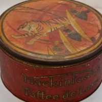 Art Deco Mackintosh Toffees tin with African warrior & jumping lion - Sold for $68 - 2018