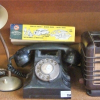 Group lot incl vintage Philips mantel radio, retro desk lamp, black bakelite rotary dial telephone, oil lamp & Pyro Volkswagen model - Sold for $75 - 2018