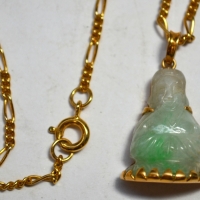 Pale green & white Jade Buddha pendant mounted on 22ct ygold with long god chain - Sold for $99 - 2018