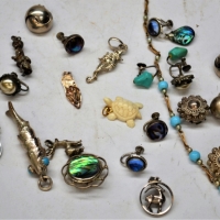 Small box mainly vintage silver jewellery incl 6 pair earrings, articulated fish & other pendants, charms, brooch etc - Sold for $43 - 2018