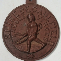 Cast Iron Shire of Caulfield plaque with ploughman emblem - Sold for $93 - 2018