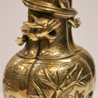 Chinese brass vase with circling dragon & 4 character mark to base 26 cm tall - Sold for $50 - 2018