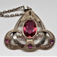 Vintage ladies silver chain with scrolled pendant set with pink stones - Sold for $75 - 2018