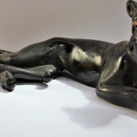 Vintage slip cast pottery reclining black panther - Sold for $27 - 2018