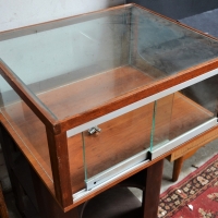 Glass and teak tabletop display case - Sold for $124 - 2018