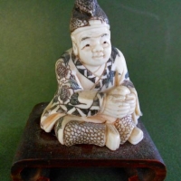 Vintage Japanese Ivory Okimono of a seated figure in Kimono - Sold for $186 - 2018