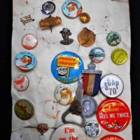 Group of vintage Badges including Christmas at Edments, Anzac, Kiss me twice etc - Sold for $35 - 2018