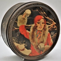 1920s Art Deco tin - Snowballing with flapper girl - Sold for $75 - 2018