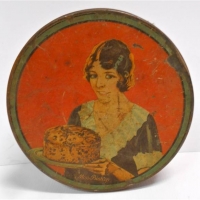 Art Deco Australian 3 lb tin - Miss Bishops Famous Cakes with image of Miss Bishop flapper girl serving a fruit cake - Sold for $99 - 2018