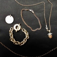 Group lot silver jewellery incl Chunky bracelet marked Tiffany & medallion, chains, pendant, bracelet etc - Sold for $43 - 2018