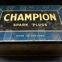 Vintage English made 'Champion Spark Plugs' tin with embossed details to end - Sold for $50 - 2018