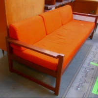Retro mid-century timber couch with orange upholstery plus matching foot stool - Sold for $149 - 2018