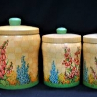 Set of 5 1940 50s tin kitchen canisters with pretty spring floral and trellis design and green knobs - Sold for $62 - 2018