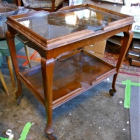 Vintage 2 tier timber auto-trolley with glass top - Sold for $37 - 2018