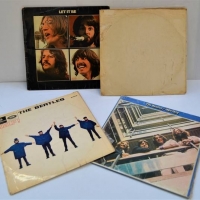 Group of Beatles LP records including The White album, Let it be and Help - Sold for $50 - 2018