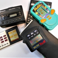 Group of retro computer games and Sony Walkman including Pinball, Backgammon, solitaire etc - Sold for $37 - 2018