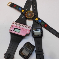 Group of retro digital watches including pink piano watch - Sold for $50 - 2018