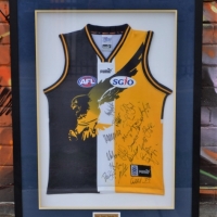 Presentation framed West Coast Eagles football club signed 2000 jumper - 100cm x 75cm - Sold for $124 - 2018