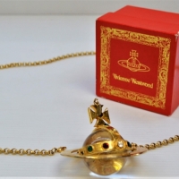 Vivienne Westwood  The Orb' pendant with chain & box (af) - Sold for $75 - 2018