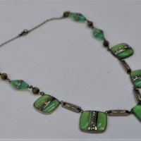 1930s necklace with greenblue glass brass backed sections and glass beads - Sold for $211 - 2018