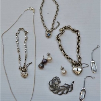 Small box silver jewellery incl Pearl stud earrings, Marcasite brooch, chain bracelets with heart locks, chain necklace etc - Sold for $43 - 2018