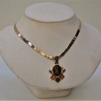 Wide flat Silver snake link chain with silver amber pendant set with various coloured amber stones - Sold for $37 - 2018