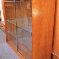 1960's blonde wood 2 door glass display cabinet - Sold for $50 - 2018