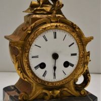 Gilt French Bronze clock on marble base by P H Mourey with twin key wind 3 14 inch face with Roman numerals - Sold for $50 - 2018