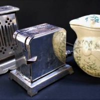 Group lot of 1930's kitchen equipment incl 2 x chrome dropside toasters and Nilson ceramic kookaburra electric kettle - Sold for $112 - 2018