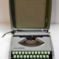 Portable cased Hermes 'Baby' portable typewriter - baby blue with teal keys - Sold for $81 - 2018