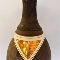 Post War Australian pottery - Lyn McDowell vase with flared rim, matt brown glaze with gold lustre and white decoration, incised signature to base, ap - Sold for $56 - 2018