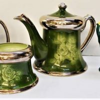 Group of European pottery - Silvered tea set including teapot and Dutch vase - Sold for $35 - 2018