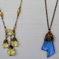 2 x vintage necklaces - 1930's blue glass drop with gilt fitting & crystal drops with faux pearls - Sold for $68 - 2018