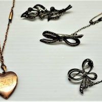 Group lot vintage jewellery - 3 Marcasite brooches, one marked Sterling and 9ct gold filled heart pendant on chain - Sold for $43 - 2018